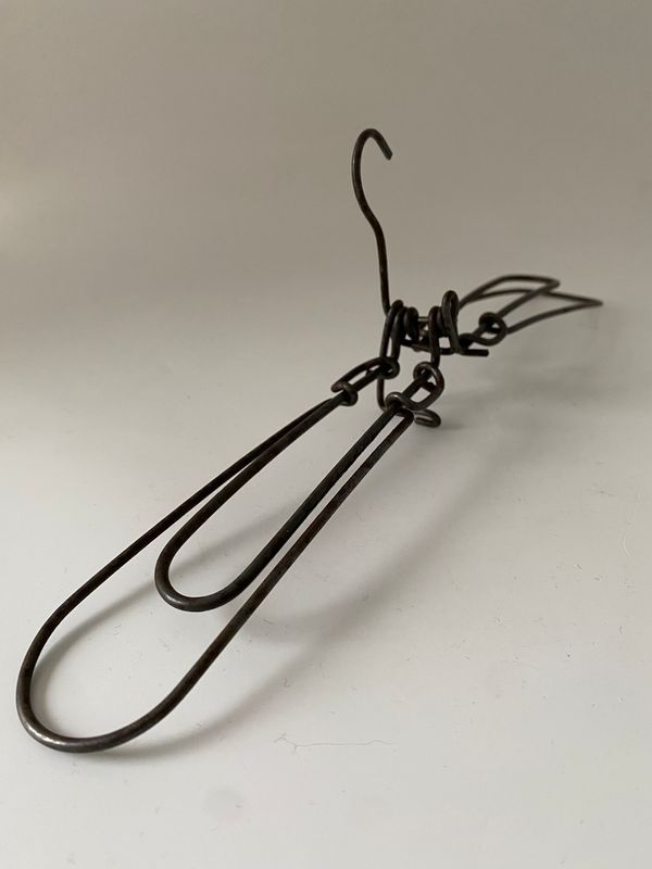 Fantearbeid justerbar kleshenger  